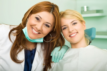 Smiling dentist with patient